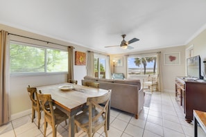 Grand Apartment, 2 Bedrooms, Oceanfront | Living area | Flat-screen TV, DVD player - Beach Place Guesthouses (Cocoa Beach)