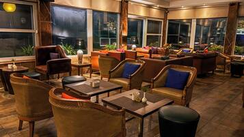 Rooftop bar, pool views, open daily