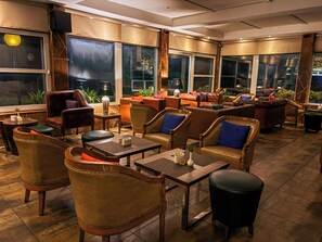 Rooftop bar, poolside views, open daily