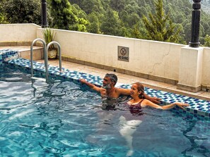 Outdoor pool, open 8:30 AM to 7 PM, pool umbrellas, sun loungers - ASIA SPA RESORT MCLEODGANJ, DHARAMSHALA CENTRALLY AIR CONDITIONED WITH HEATED SWIMMING POOL (Dharamshala)
