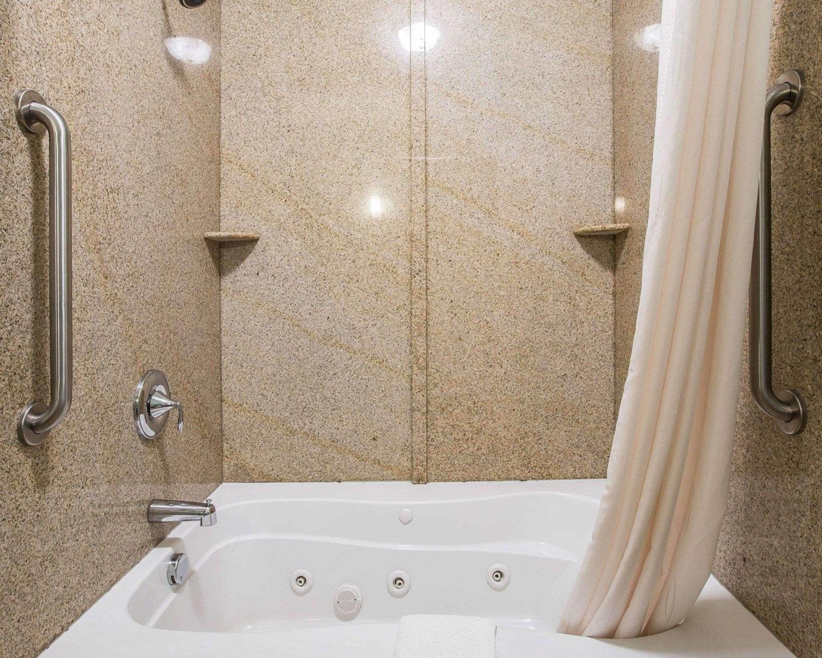 pillow-top beds, desk, laptop workspace, blackout curtains