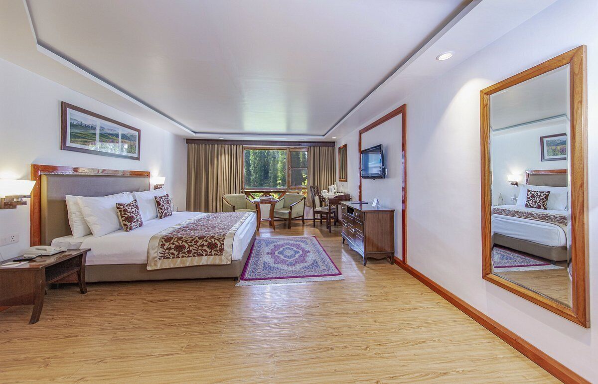 Deluxe room with Balcony- Pine View | Minibar, iron/ironing board, free WiFi, bed sheets