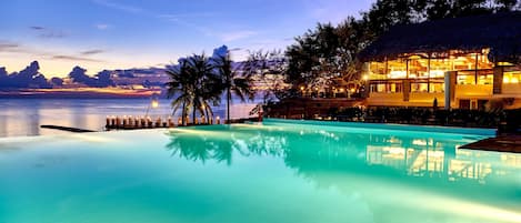 Outdoor pool, open 6:00 AM to 6:00 PM, pool umbrellas, sun loungers