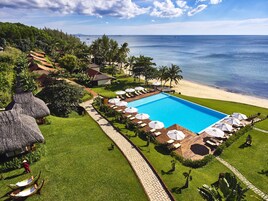 Outdoor pool, open 6:00 AM to 6:00 PM, pool umbrellas, sun loungers