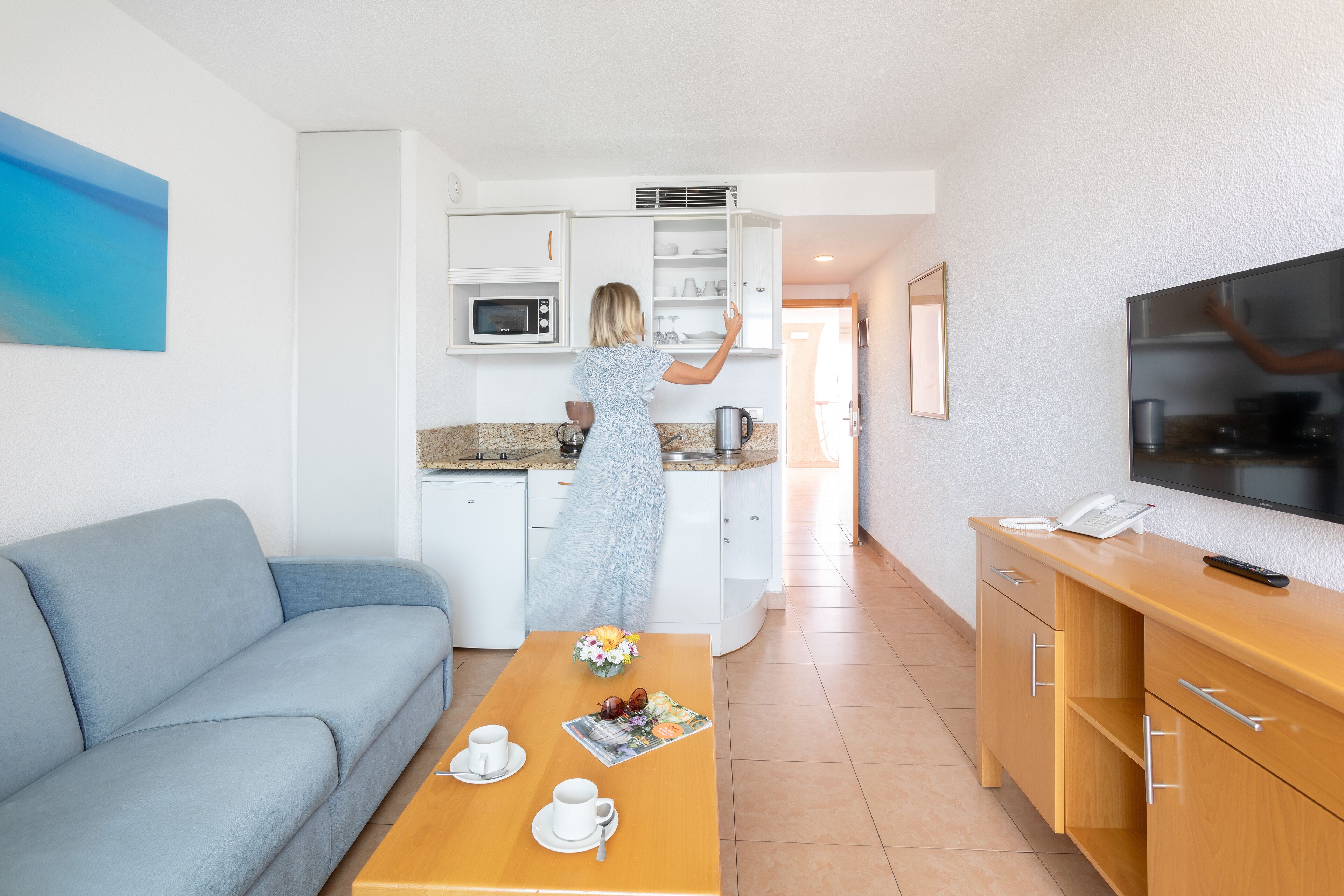 Fridge, microwave, stovetop, coffee/tea maker