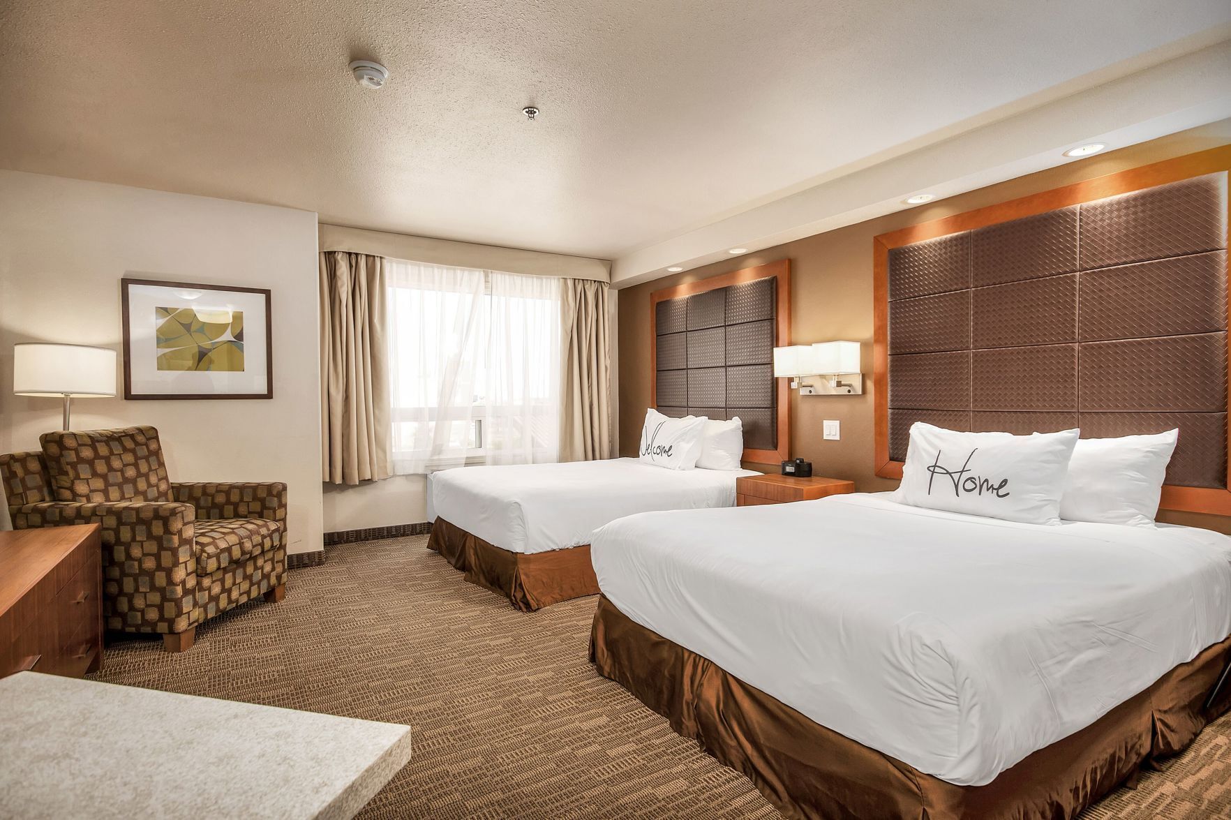 Pillow-top beds, desk, laptop workspace, blackout curtains