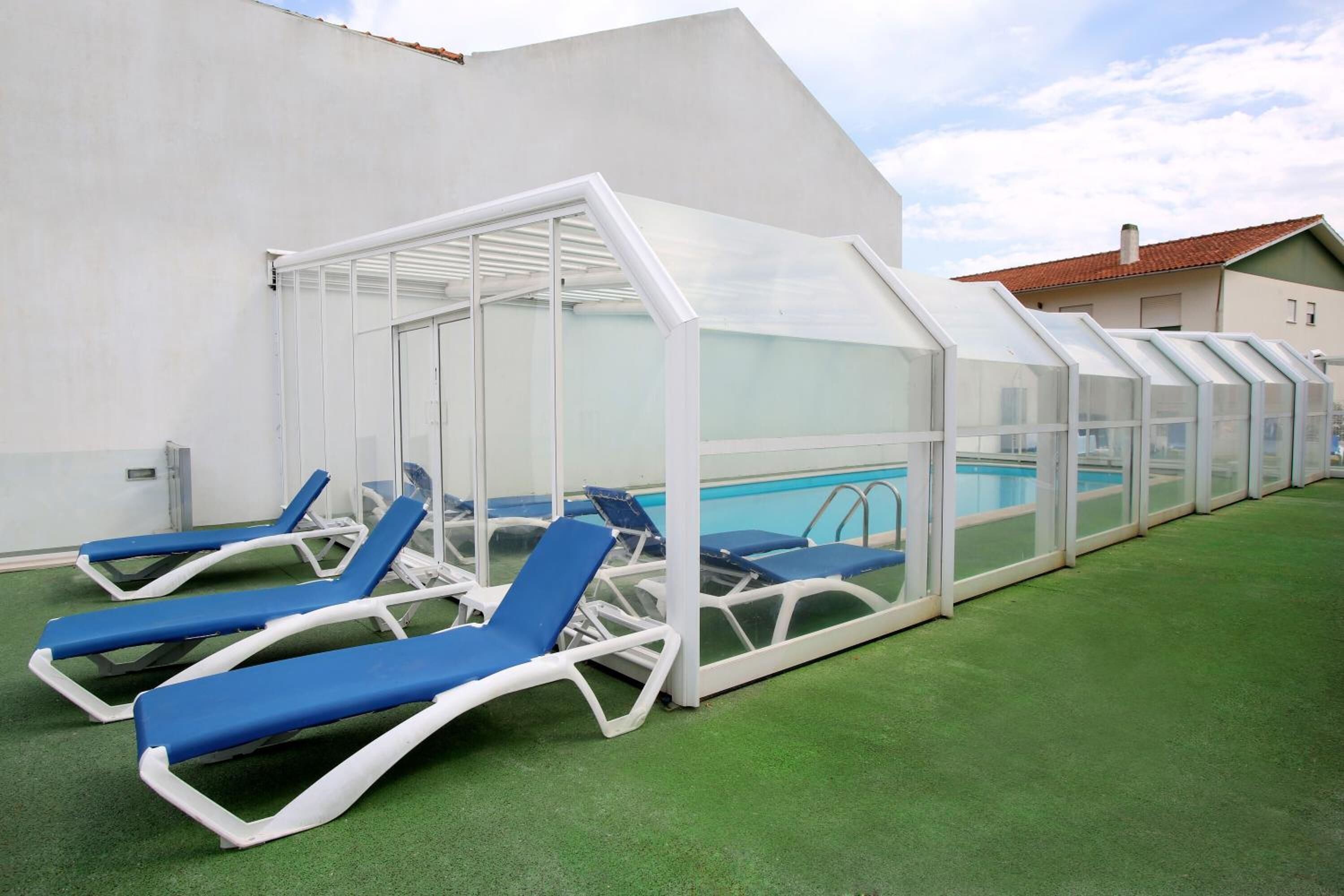 indoor pool, outdoor pool, open 9 am to 9 pm, pool loungers