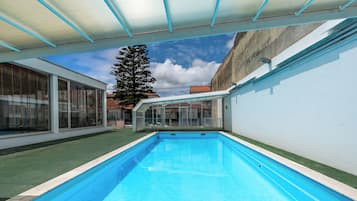 Indoor pool, outdoor pool, open 9 AM to 9 PM, pool loungers