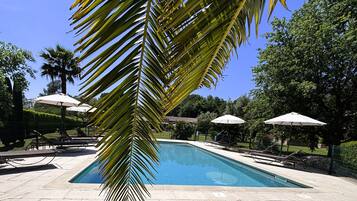 Outdoor pool, open 8:00 AM to 8:00 PM, pool umbrellas, sun loungers