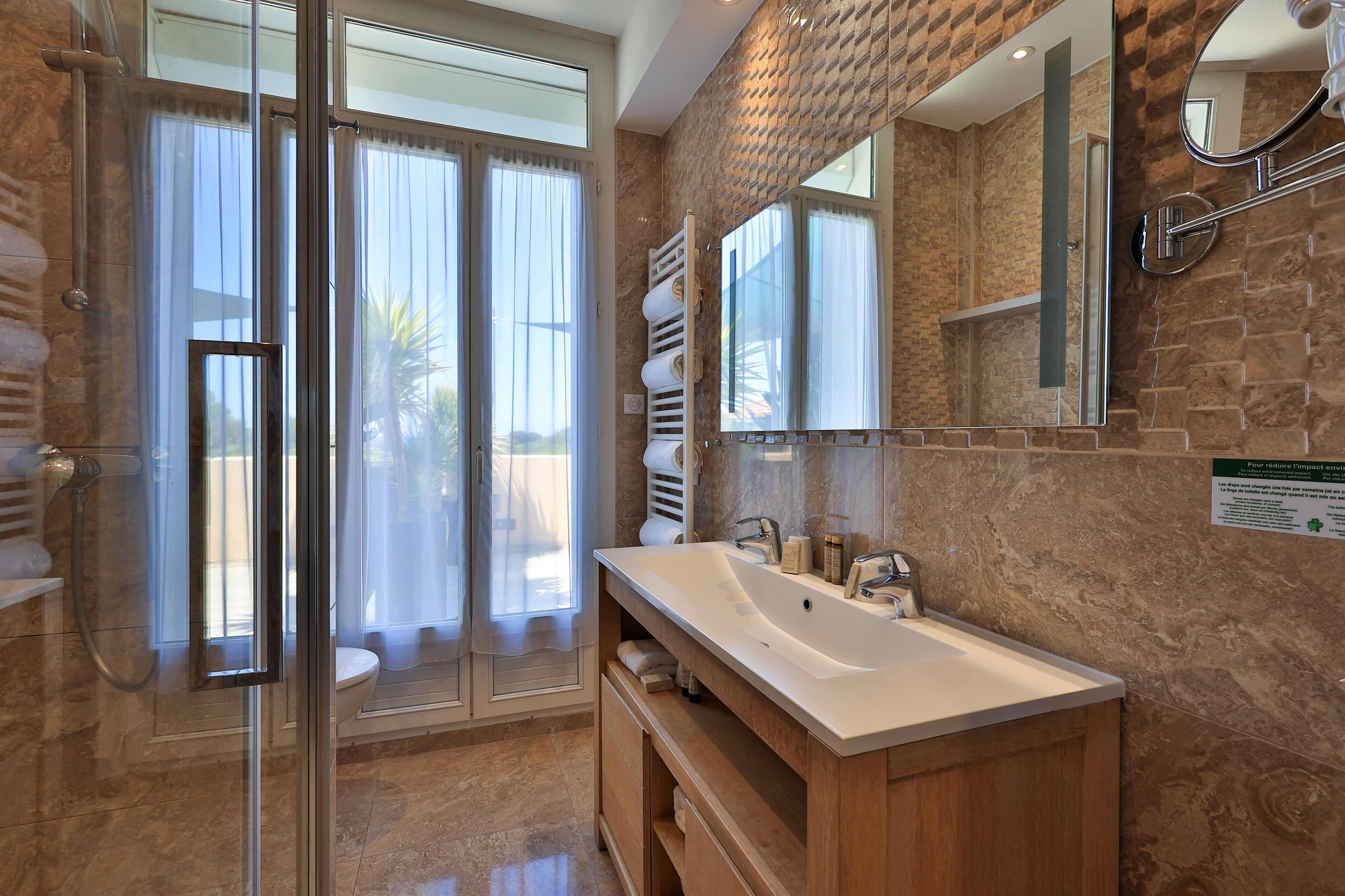 superior family suite | bathroom | hair dryer, towels