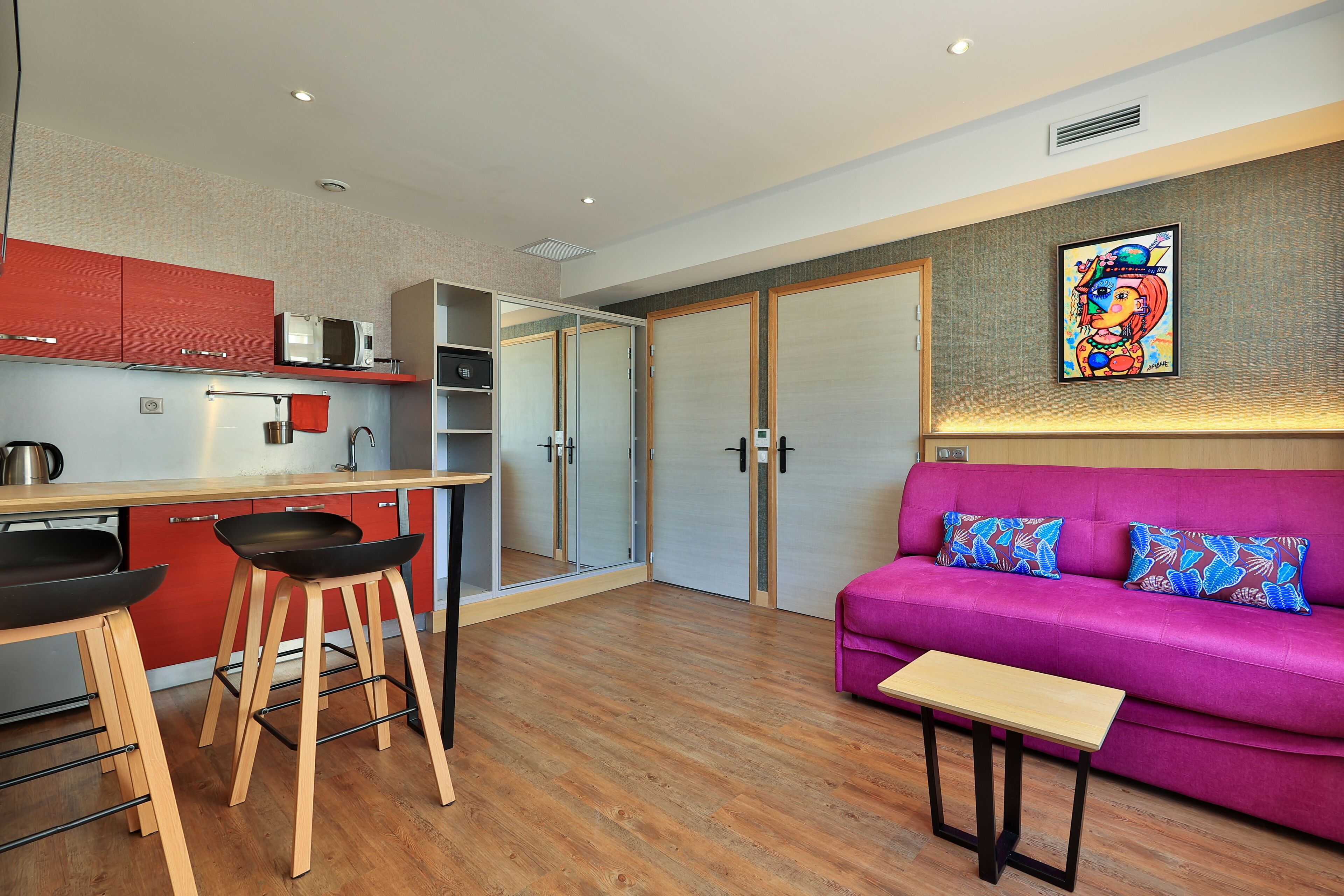 comfort apartment | living area | flat-screen tv