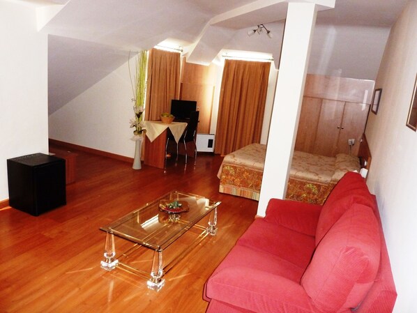 Down duvets, pillow-top beds, desk, rollaway beds