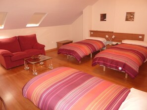 Down duvets, pillow-top beds, desk, rollaway beds