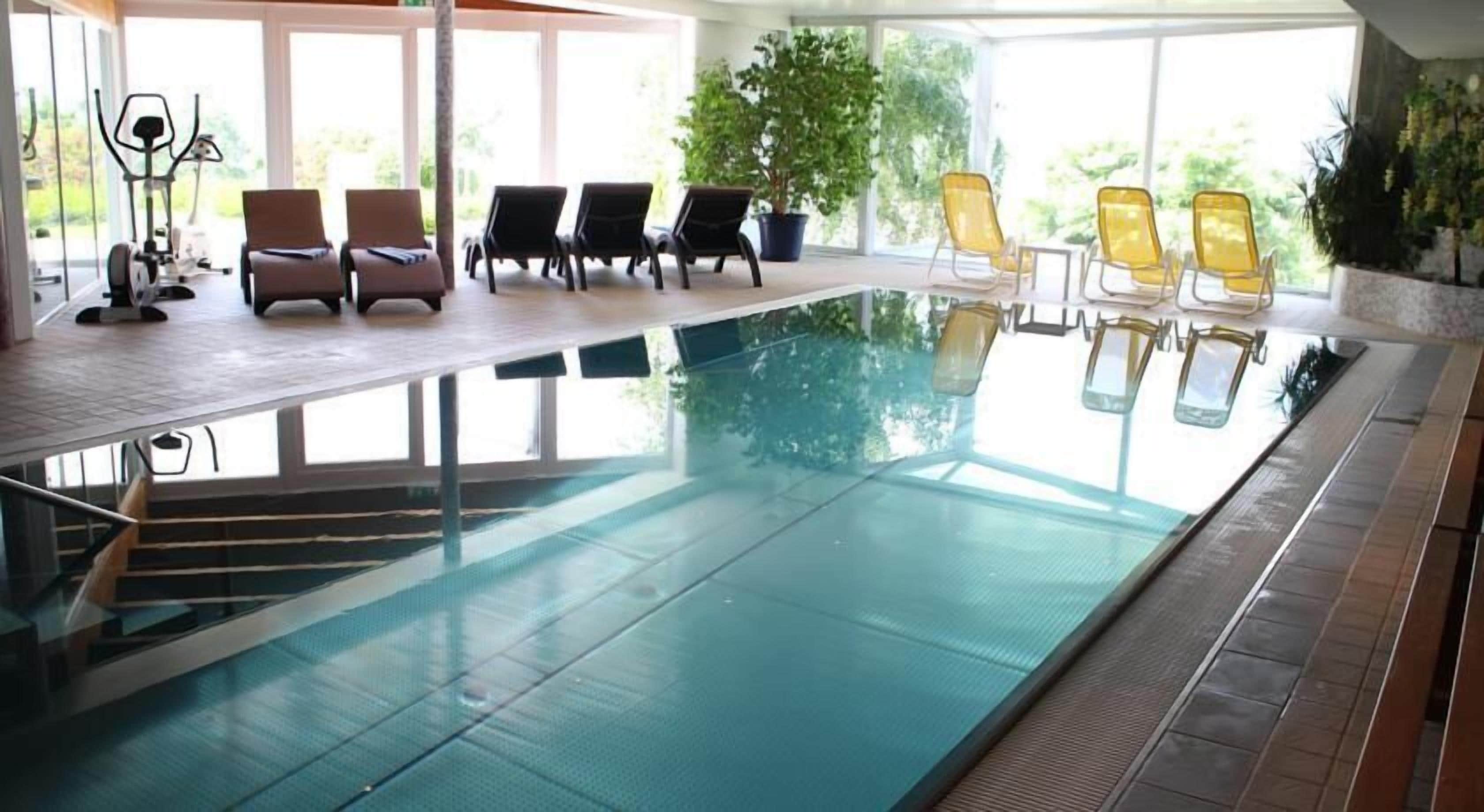indoor pool, pool loungers