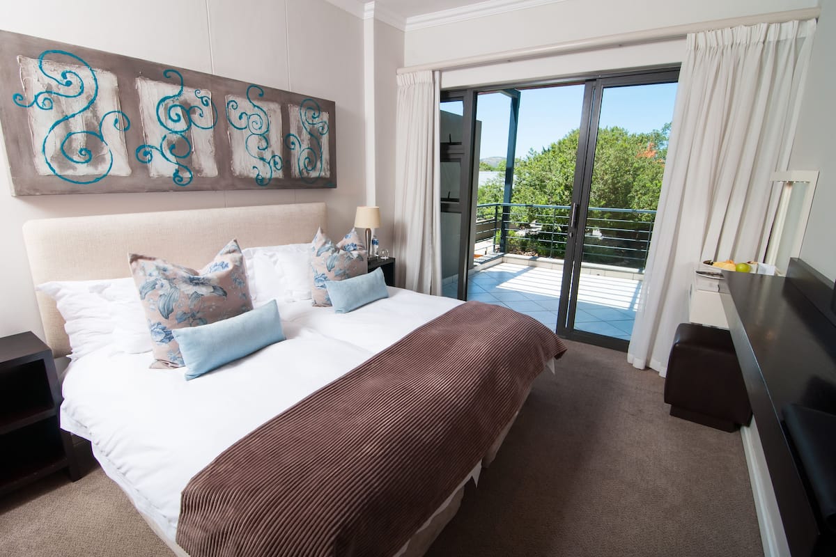 suite, 2 bedroom , waterfront, king bed  and 2 single beds | 1 bedroom, premium bedding, minibar, in-room safe