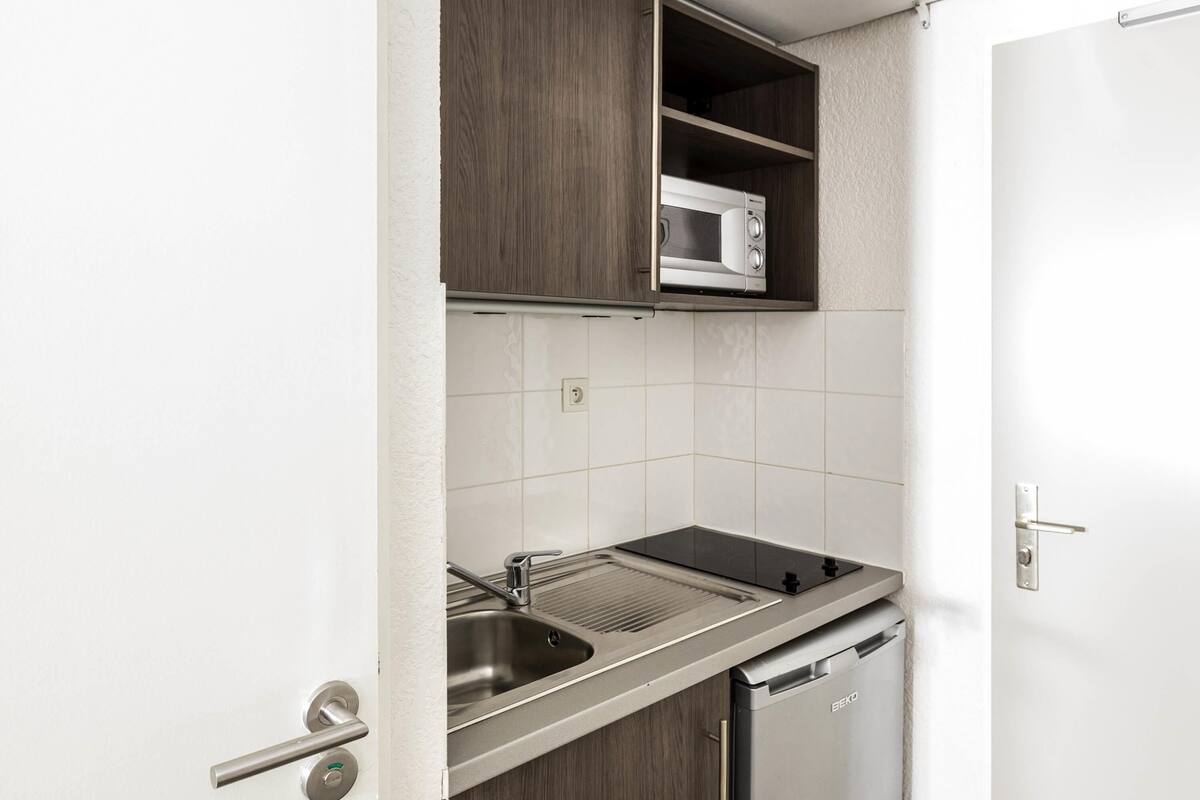 Desk, blackout curtains, soundproofing, iron/ironing board