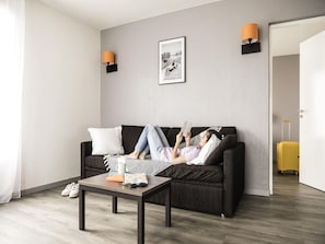 Apartment, 1 Bedroom | Desk, blackout curtains, soundproofing, iron/ironing board - Aparthotel Adagio Access Orléans (Orléans)
