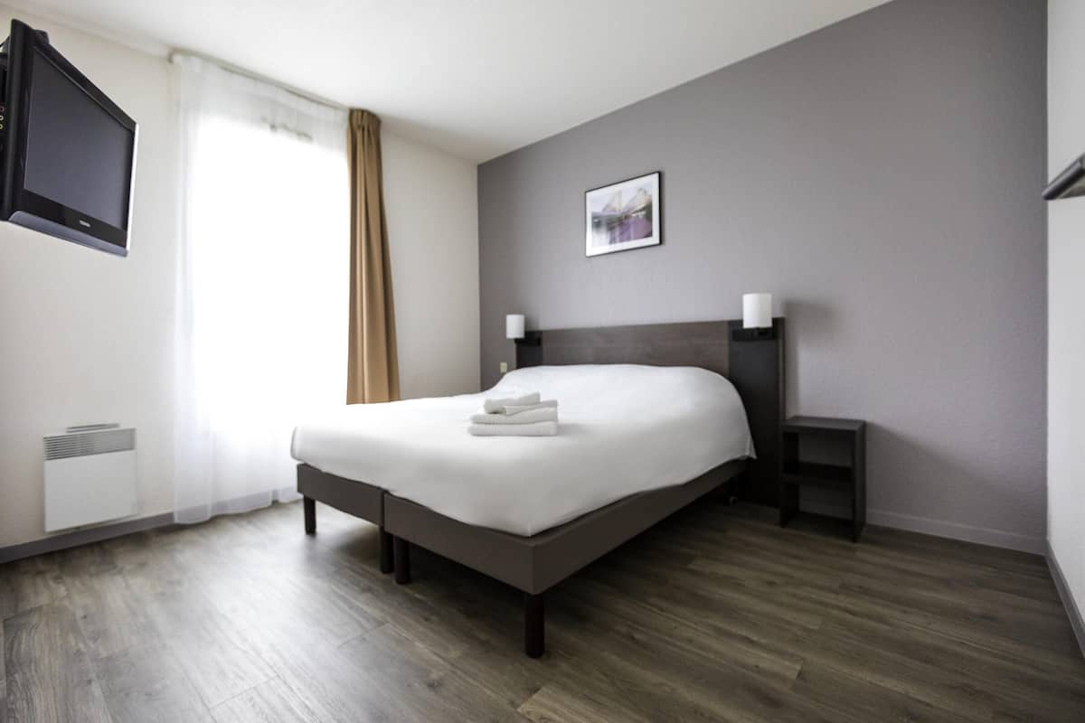 Desk, blackout drapes, soundproofing, iron/ironing board