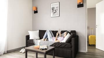 Apartment, 1 Bedroom | Desk, blackout drapes, soundproofing, iron/ironing board
