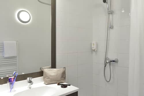 Eco-friendly toiletries, hair dryer, towels