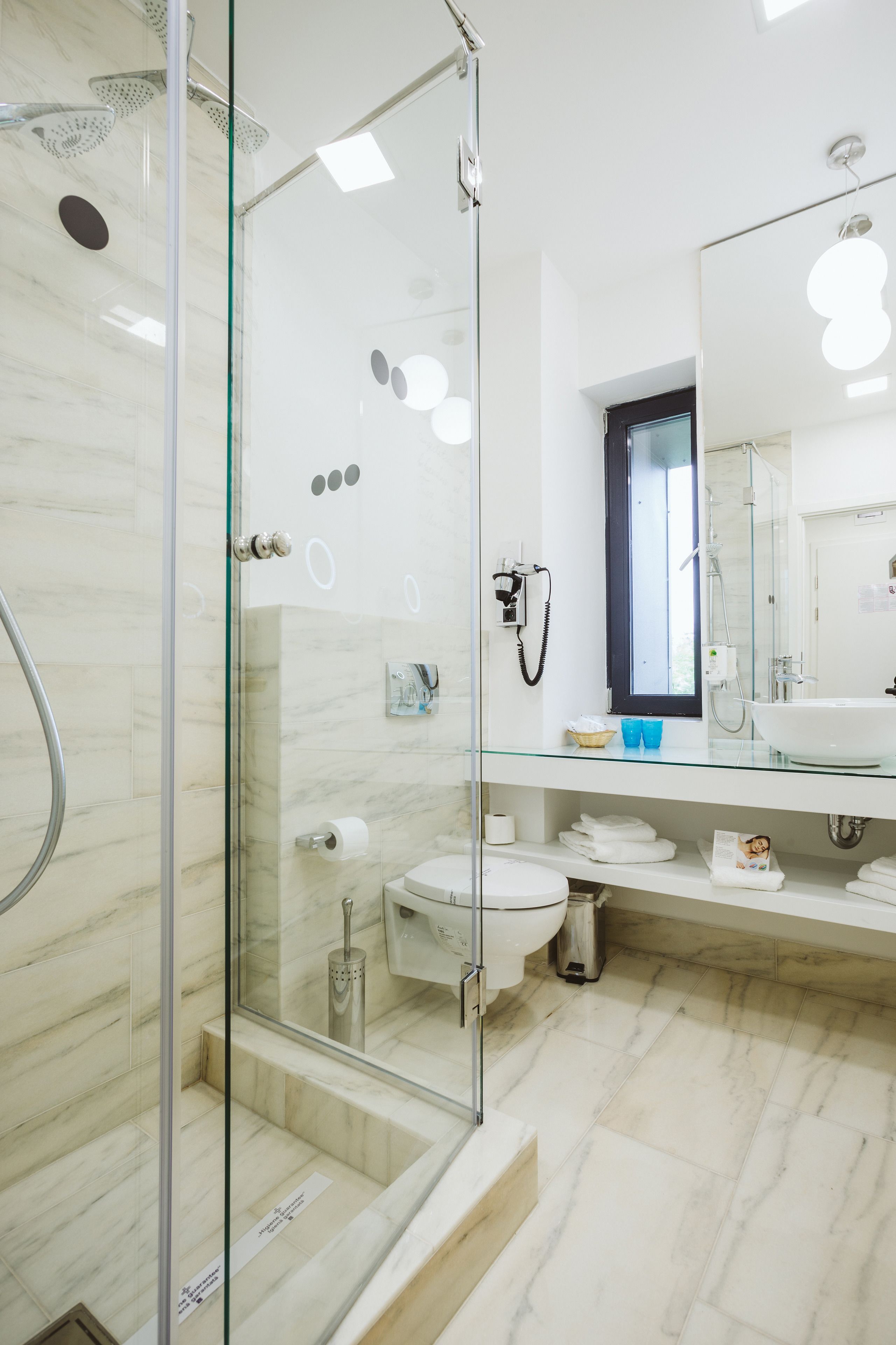 twin room | bathroom | shower, free toiletries, hair dryer, towels