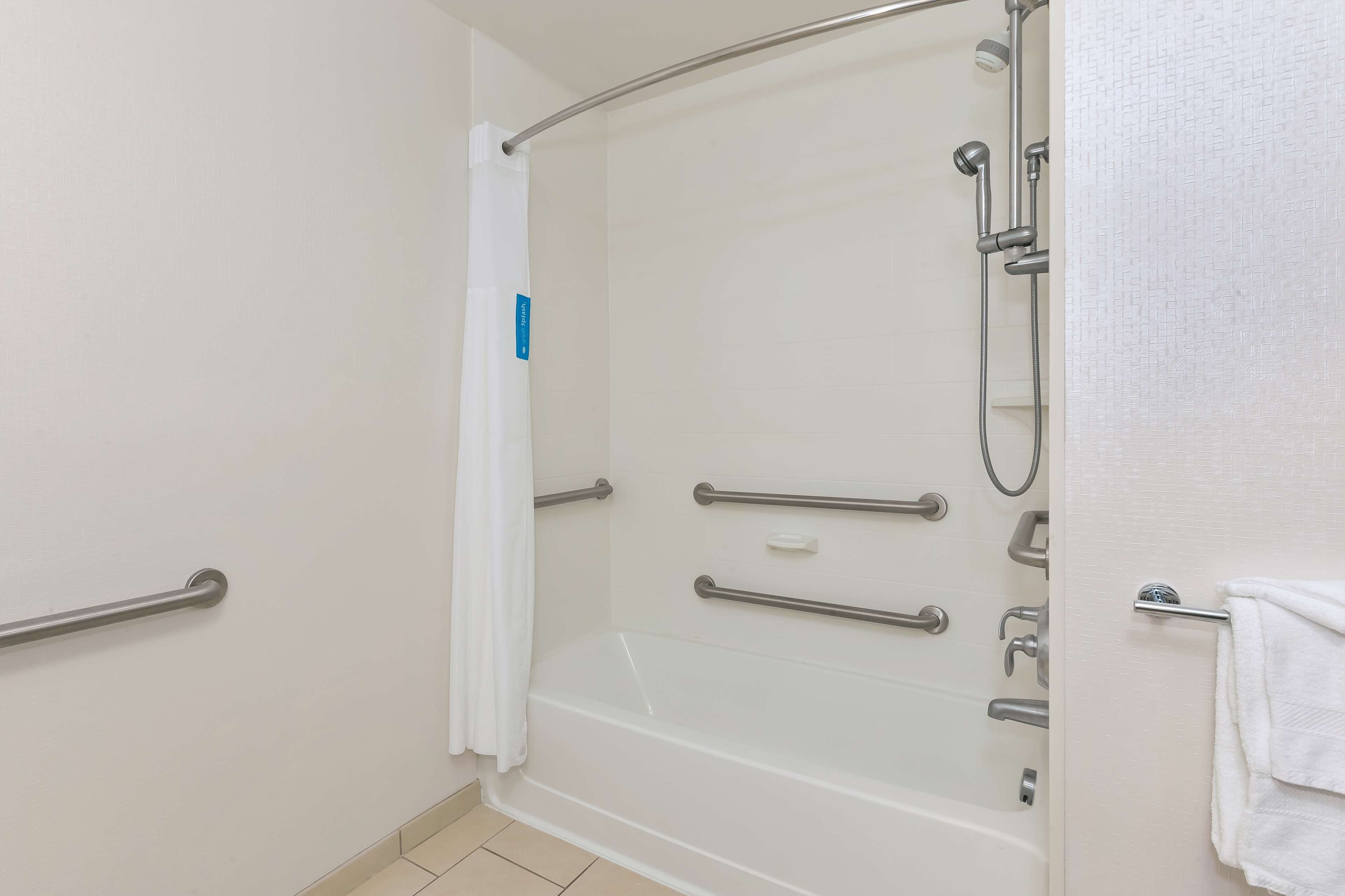 studio, 1 king bed, accessible, non smoking | bathroom | bathtub, hair dryer, towels