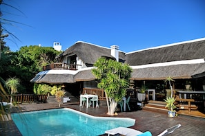 Outdoor pool, pool umbrellas, sun loungers