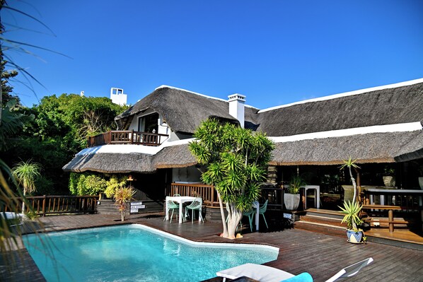 Outdoor pool, pool umbrellas, sun loungers