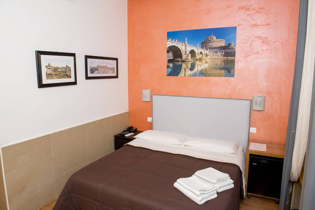 Premium bedding, pillow-top beds, free minibar, in-room safe