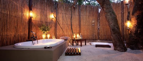 Separate tub and shower, deep soaking tub, free toiletries, towels