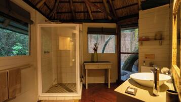 Separate tub and shower, deep soaking tub, free toiletries, towels