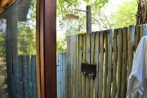 Separate tub and shower, deep soaking tub, eco-friendly toiletries