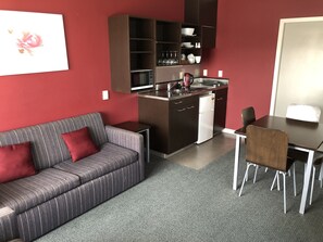 1 Bedroom Apartment with Kitchenette (Accessible Facility) | Private kitchenette | Microwave, stovetop, electric kettle, cookware/dishes/utensils