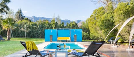Outdoor pool, pool umbrellas, pool loungers