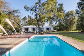 Outdoor pool, pool umbrellas, sun loungers