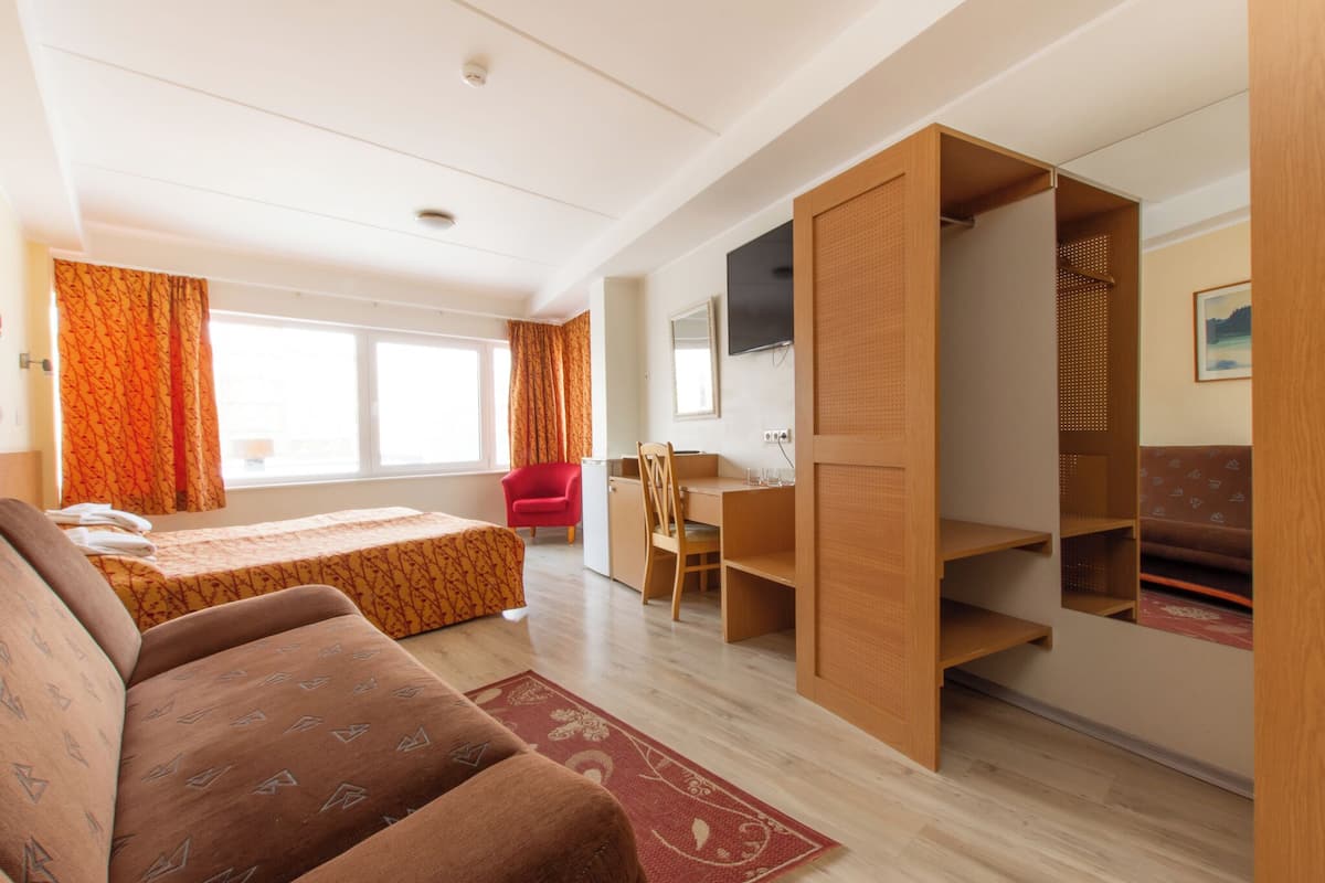 Family Room | Hypo-allergenic bedding, Select Comfort beds, desk, iron/ironing board