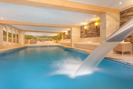 Indoor pool, open 7:00 AM to 10:00 PM, sun loungers