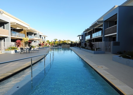 Outdoor pool, pool umbrellas, sun loungers