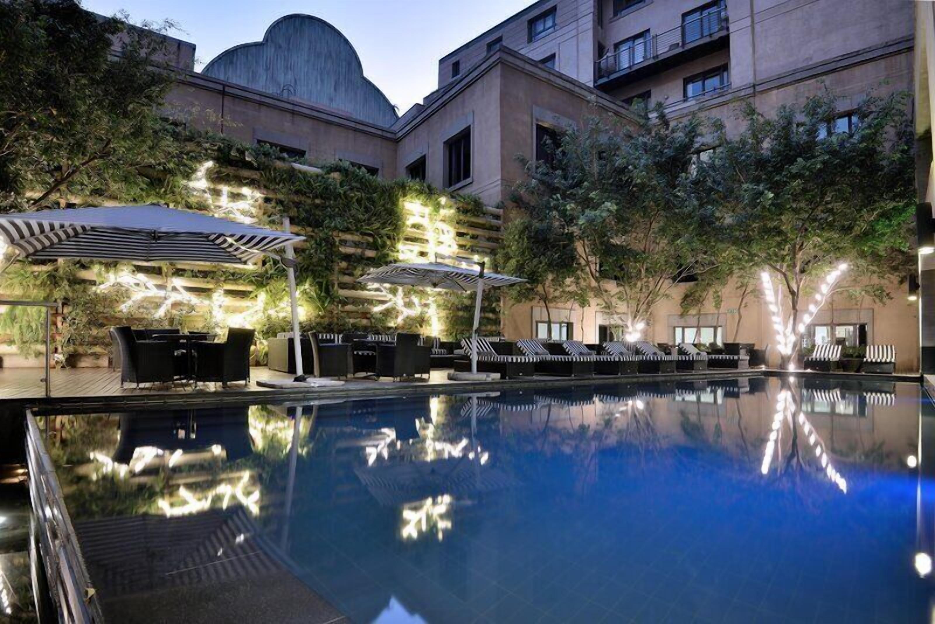 Outdoor pool, pool umbrellas, sun loungers