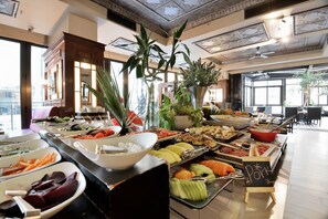 Breakfast, lunch, dinner served; al fresco dining 