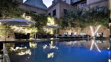Outdoor pool, pool umbrellas, pool loungers