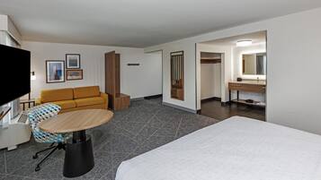 Studio Suite, 1 King Bed | Living area | 32-inch flat-screen TV with premium channels, TV