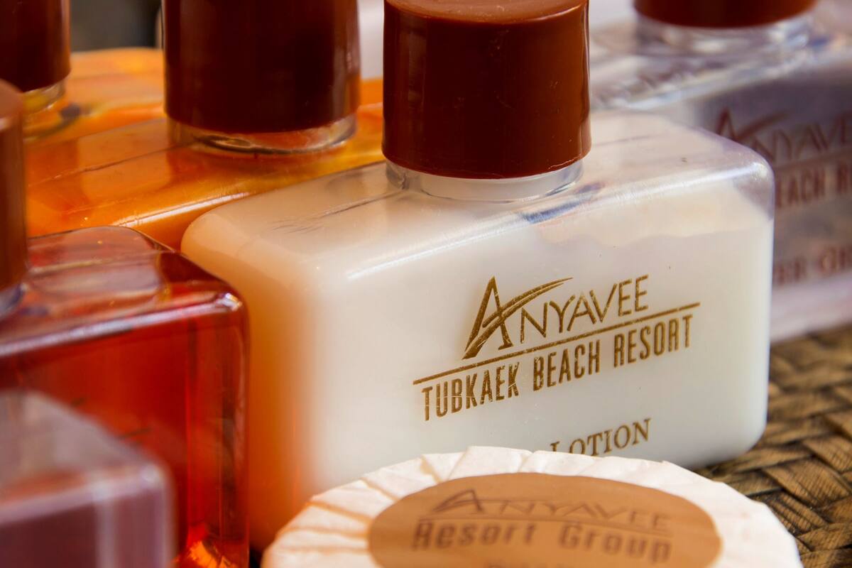 2 bedrooms beach front pool villa | bathroom | rainfall showerhead, free toiletries, hair dryer, bathrobes