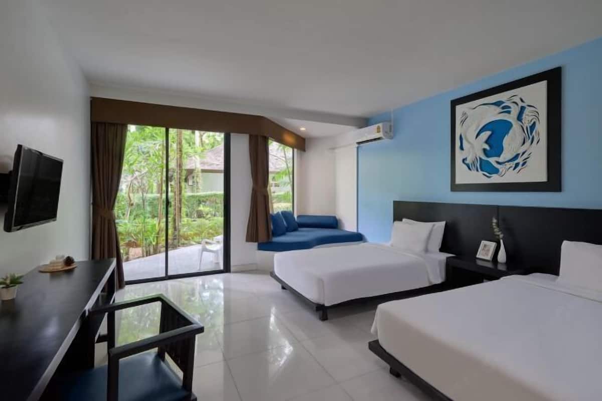 Een minibar, een kluis op de kamer, een bureau, gratis wifi