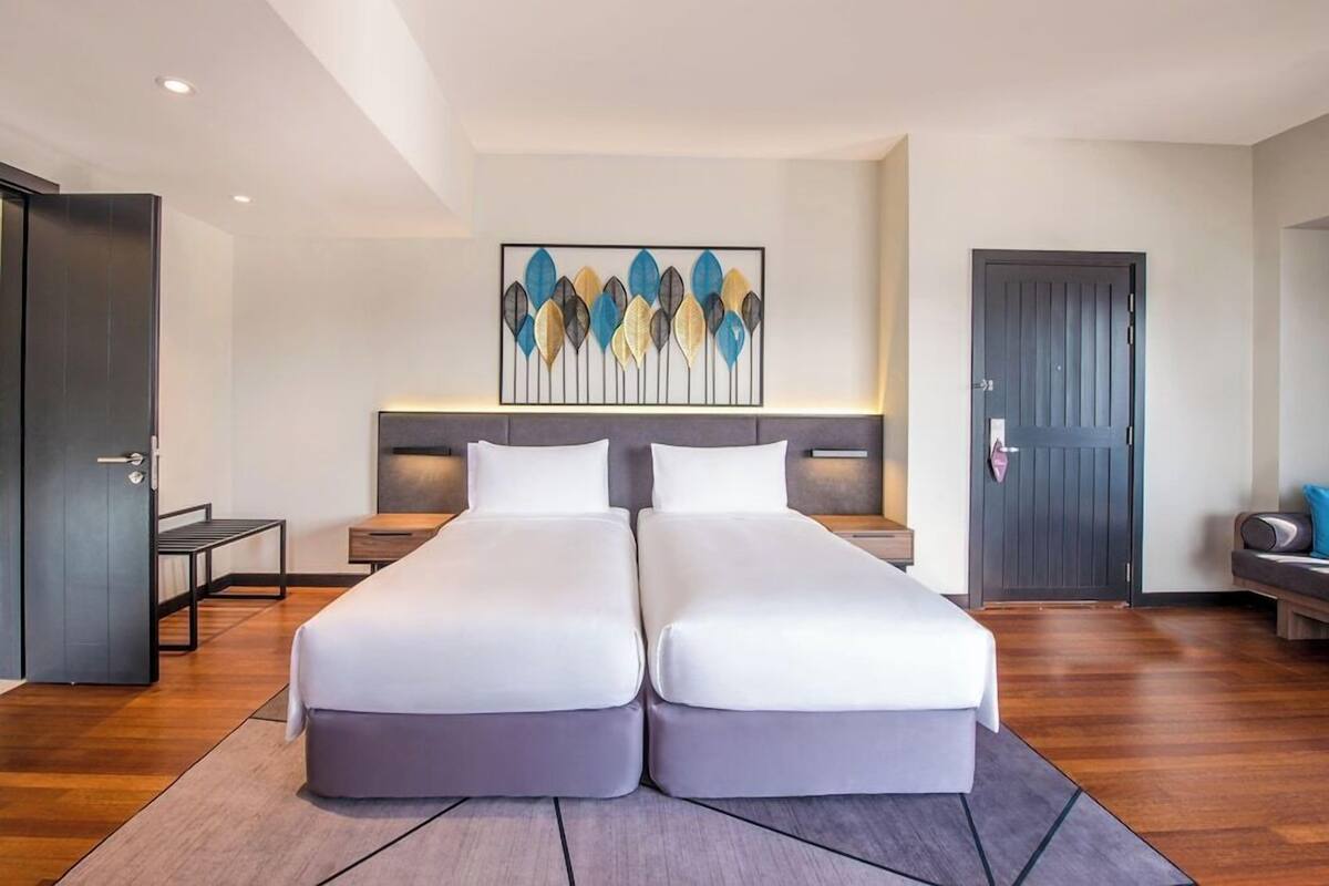 Premium bedding, down comforters, Select Comfort beds, minibar