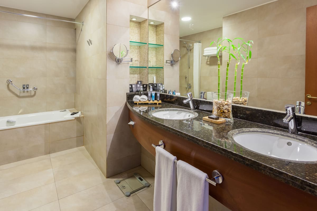 bathroom | deep-soaking bathtub, free toiletries, hair dryer, bathrobes