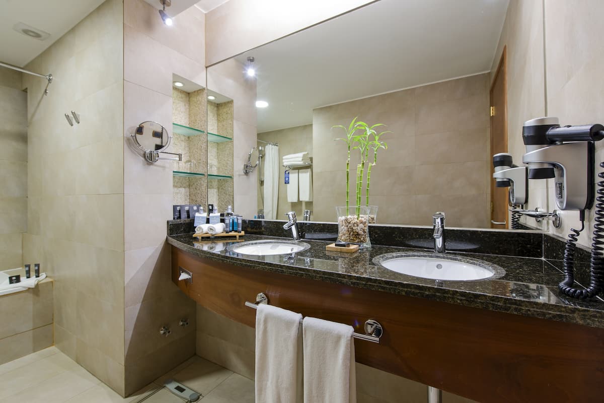bathroom | deep-soaking bathtub, free toiletries, hair dryer, bathrobes