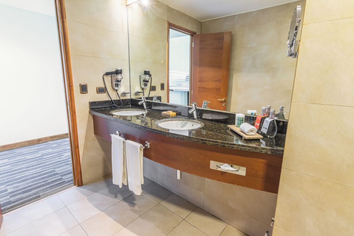 deep-soaking bathtub, free toiletries, hair dryer, bathrobes