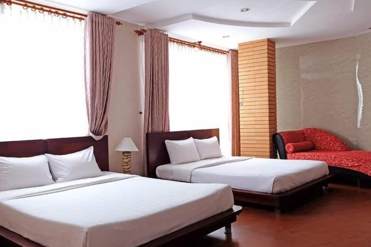 Rom – deluxe, 2 dobbeltsenger | Minibar, safe på rommet, blendingsgardiner og wi-fi (inkludert)