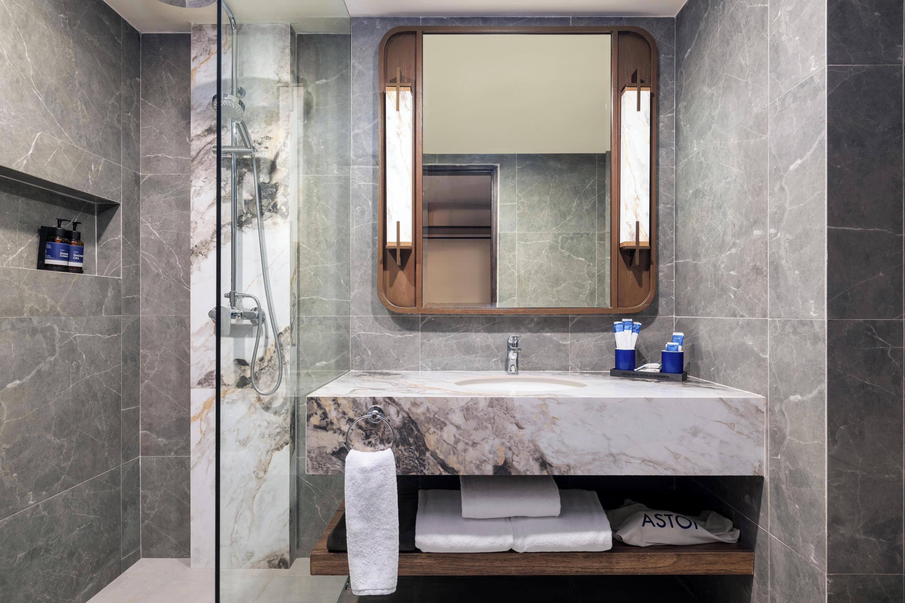 family suite | bathroom | free toiletries, hair dryer, slippers, towels